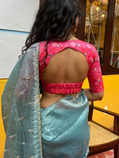 Gold tissue crush saree with mirror work blouse