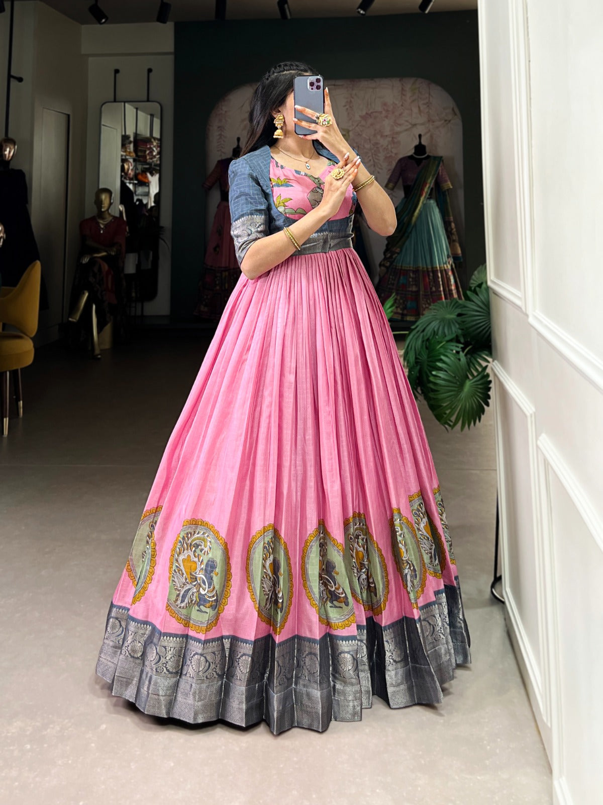 Dola Silk gowns with intricate details for a regal look